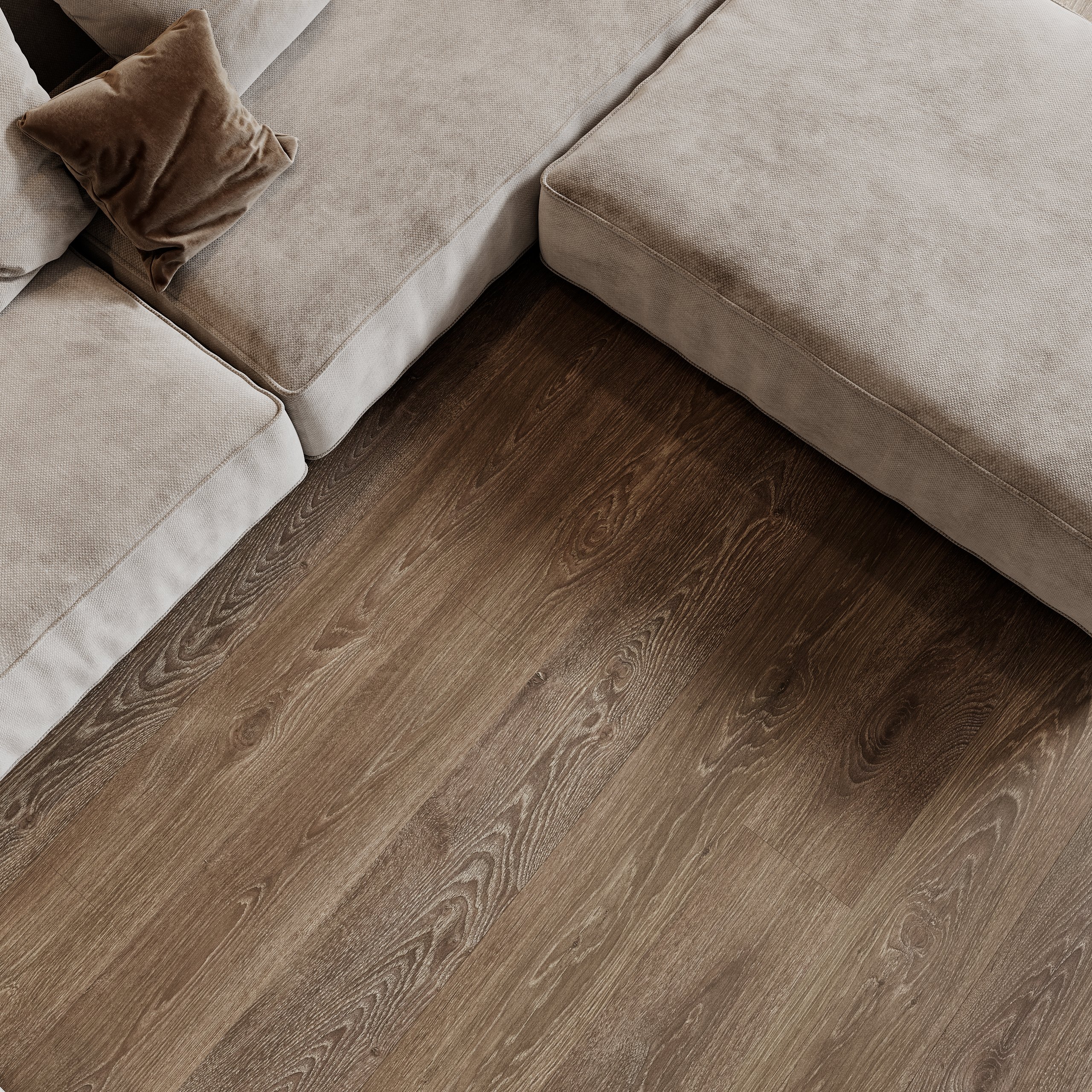 Wood parquet floor planks in interior with sofa and pillows